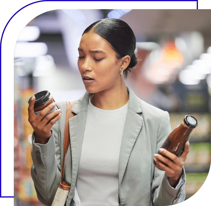 Woman looking at food labels.