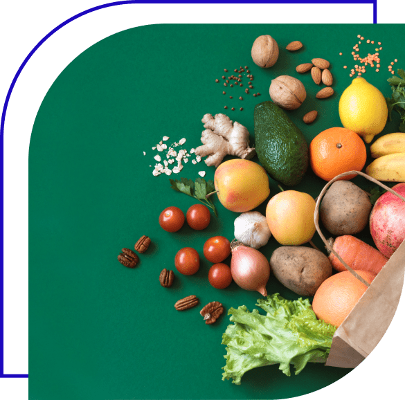 Paper bag holding fruits, veggies, and nuts.