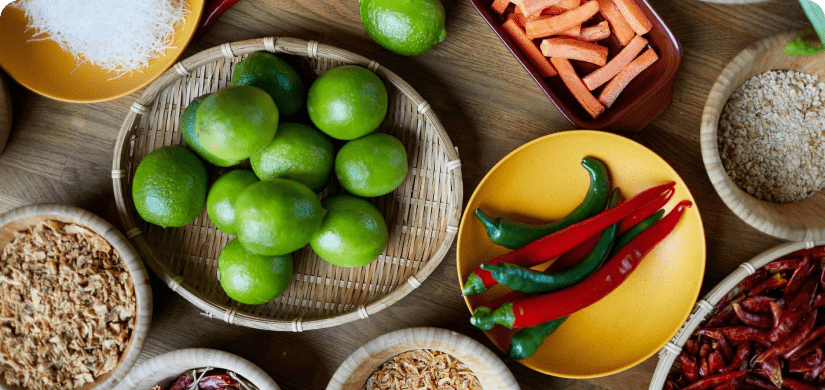 Assortment of chilis, spices, and lemons.