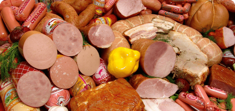 Assortment of processed meats used in meat slices demonstrating Changes to USDA Meat Temperature Regulations