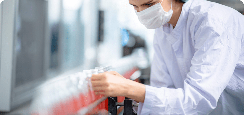 food technician control checking production line of water drink in manufacturing factory demonstrating Food Ethics.