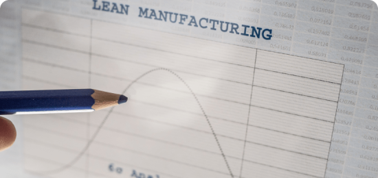 Pencil pointing to graph on Lean Manufacturing.